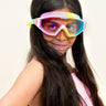 girl smiling wearing panoramic rainbow kids swim goggles which feature a panoramic wide frame and a rainbow colored silicone gasket