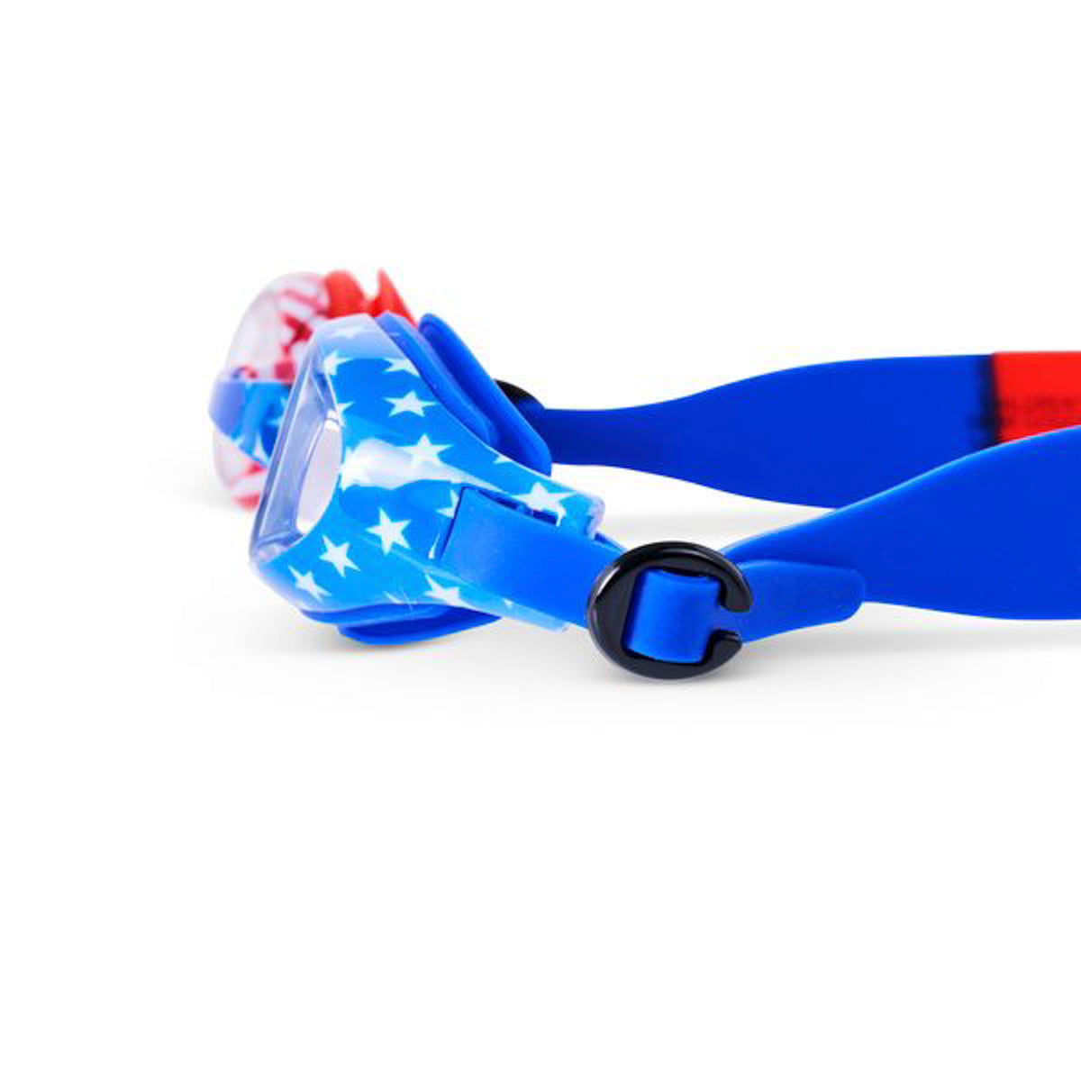close up angled shot of usa waves kids' swim goggles showing a stars and stripe print on the frame in red, white and blue colors. the strap features a red and blue swirl